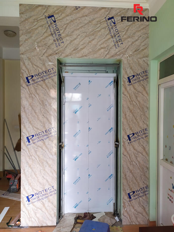 Công trình thi công mặt thang máy bằng tấm nhựa PVC vân đá tại 44 An Hòa
