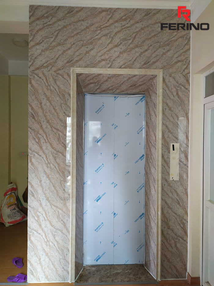 Công trình thi công mặt thang máy bằng tấm nhựa PVC vân đá tại 44 An Hòa